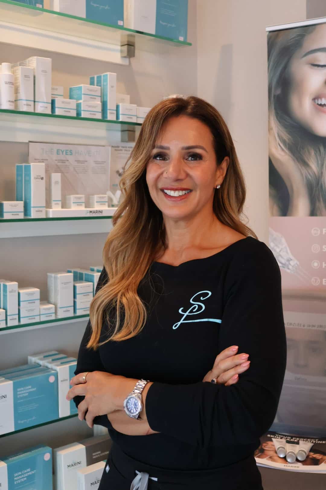 a woman standing in front of a store